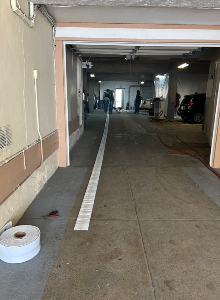 Structural epoxy pipe liner laid out in hallway prior to CIPP inversion